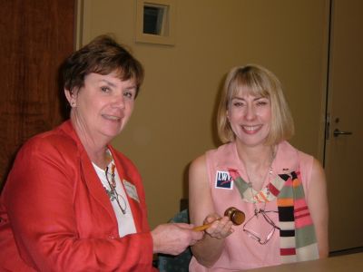 Sarah McDonald passes LWVGB president's gavel to Yvonne Brakefield, May, 2005